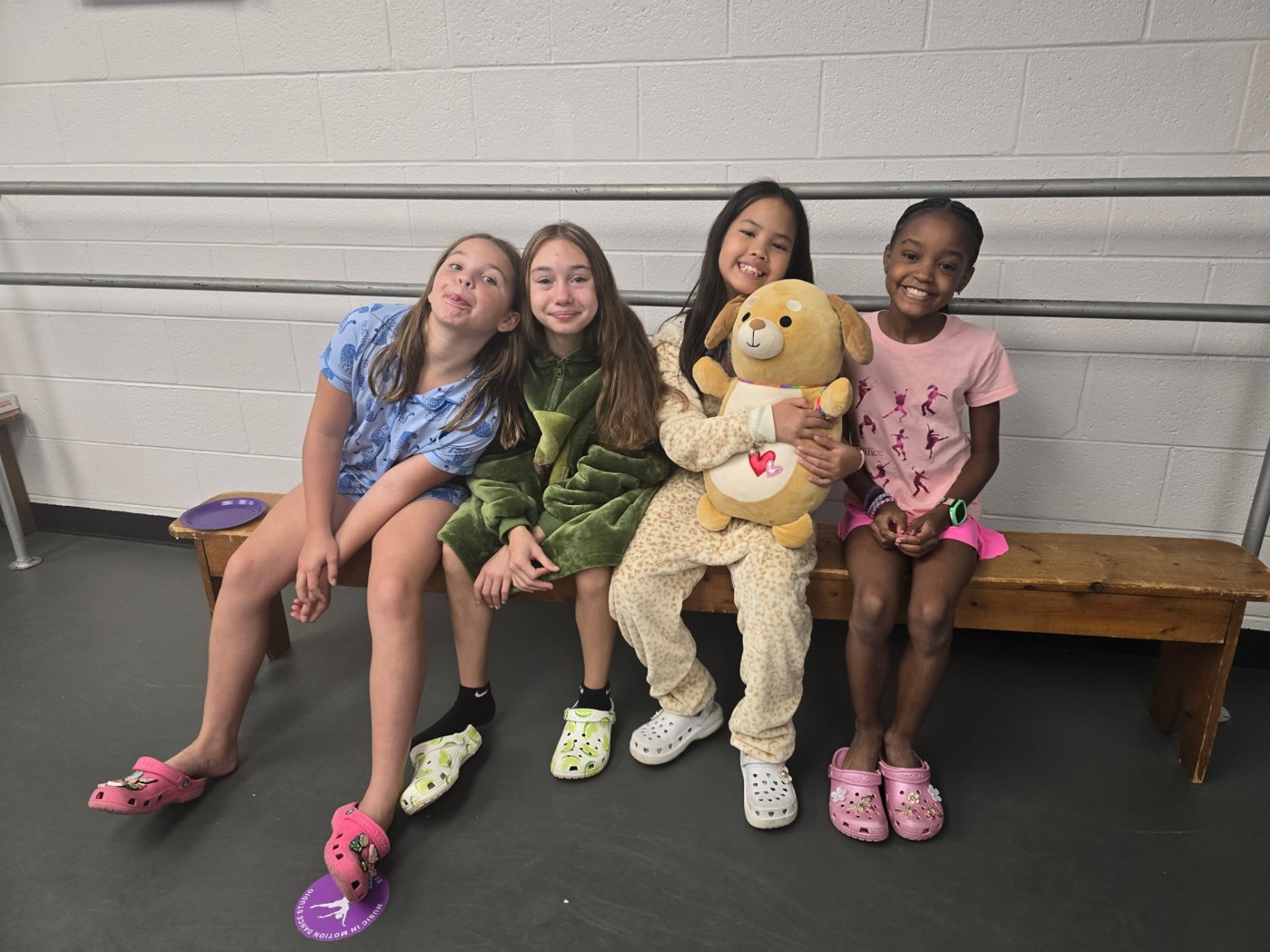 Dance friends sharing a relaxed moment together at the studio