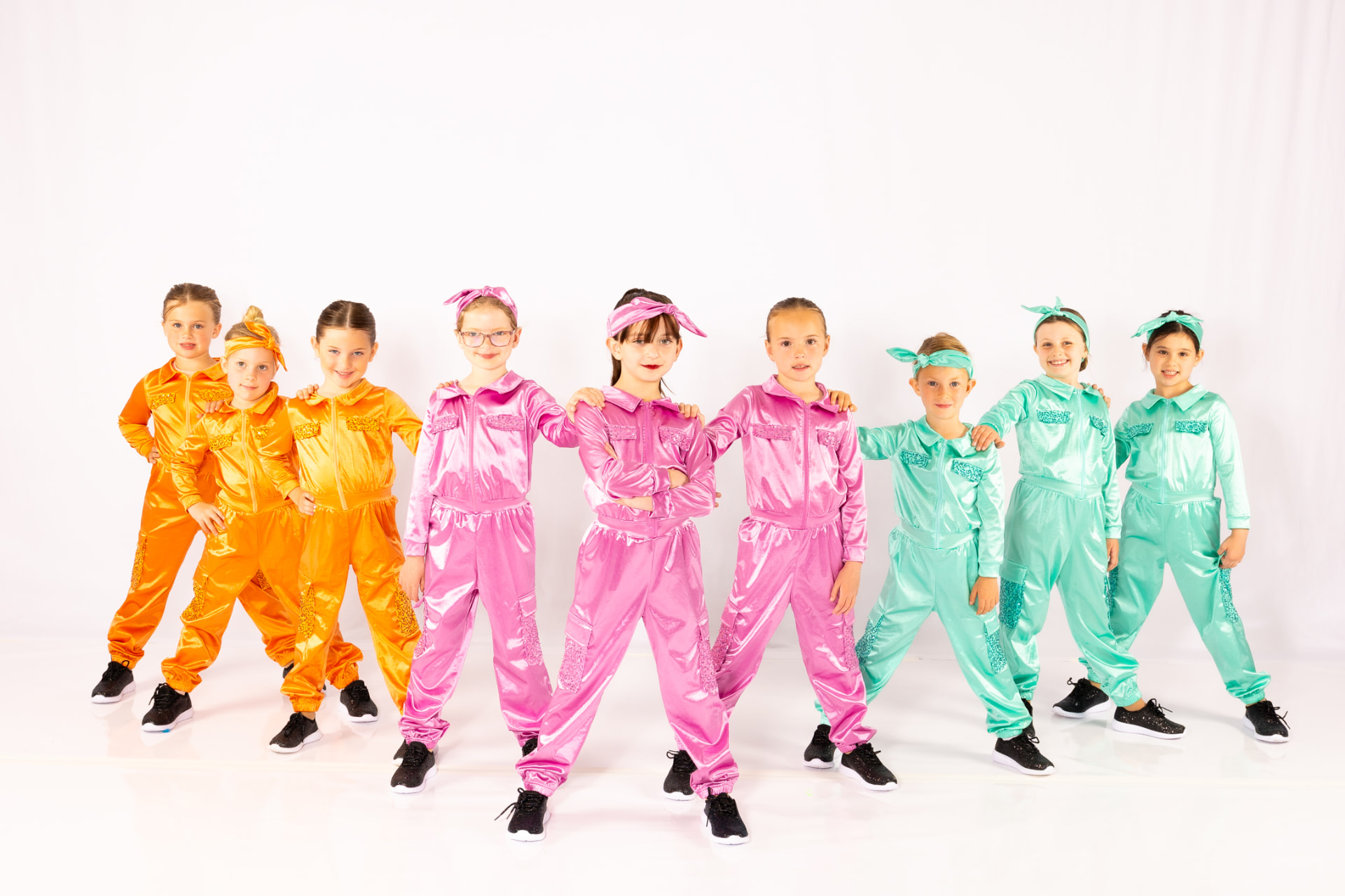 A Music in Motion hip hop class posing together