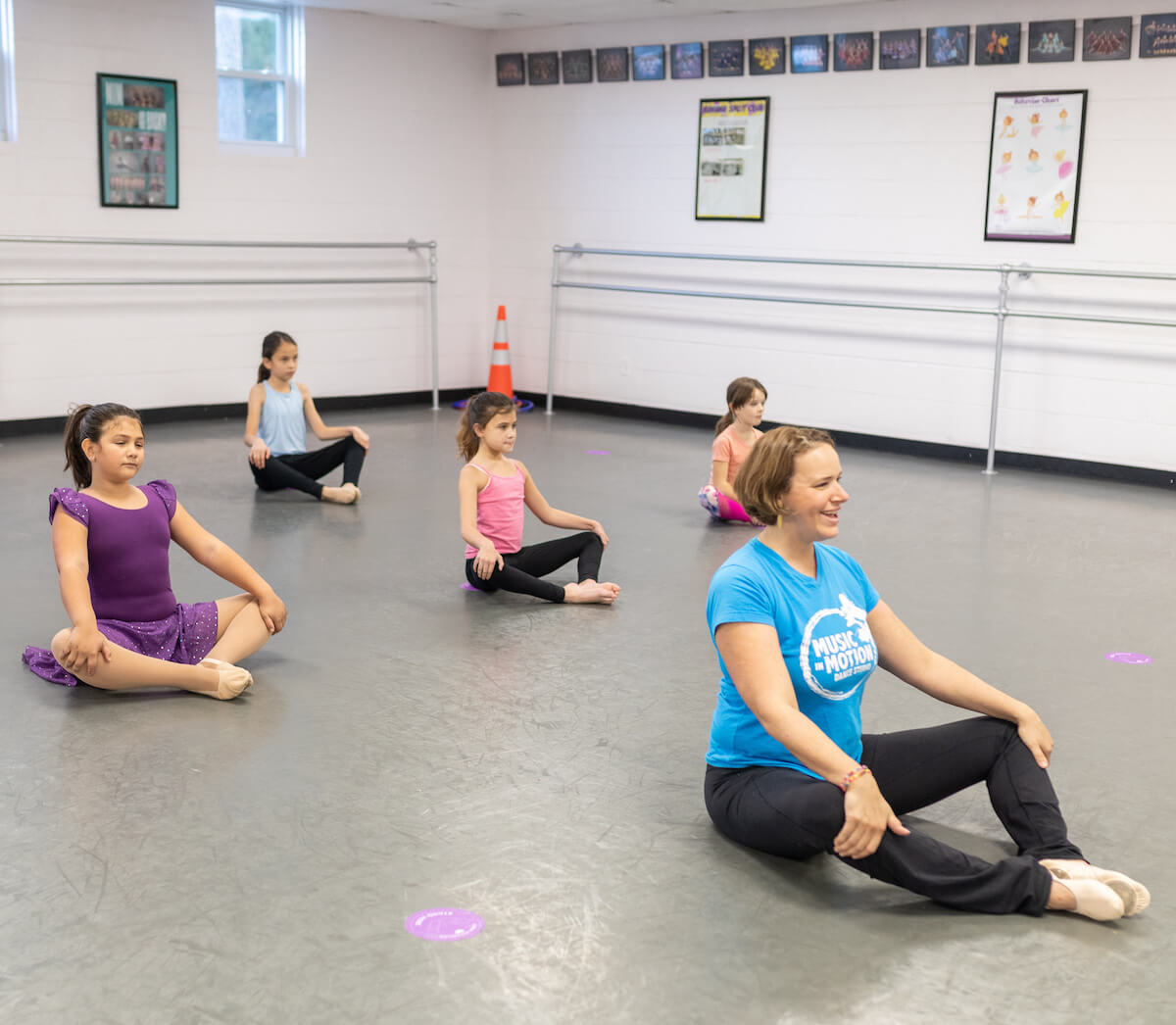 Inside a Music in Motion studio with mirrors and dance floor