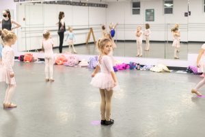 Child dancer looking at camera