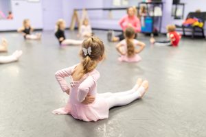 preschool dancer listening to teacher